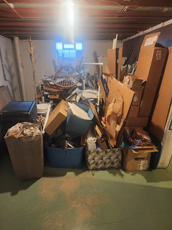 Roll-off dumpster container at job site for 15 Yard Dumpster Rental in Northfield